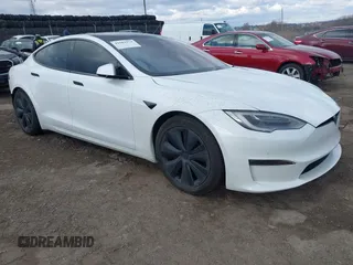 2022 Tesla Model S with VIN 5YJSA1E50NF469579, listed as a IAAI auction lot 41682974 with 48,519 mi miles and . Bid and sale history available at DreamBid. Image 1.