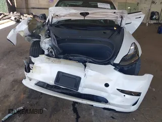 2022 Tesla Model 3 Long Range z VIN 5YJ3E1EB1NF192570, wystawiony jako IAAI lot #42230750 z przebiegiem 63 462 mil mil oraz . Historia ofert i sprzedaży dostępna na DreamBid. Obrazek 6.