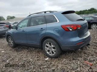 2014 Mazda CX-9 Touring with VIN JM3TB3CV9E0438479, listed as a Copart auction lot 60099695 with 113,083 mi miles and Clean title. Bid and sale history available at DreamBid. Image 2.
