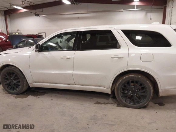 2016 Dodge Durango R/T with VIN 1C4SDJCT2GC363143, listed as a IAAI auction lot 41740548 with 115,774 mi miles. Bid and sale history available at carsss.com. Image 14.