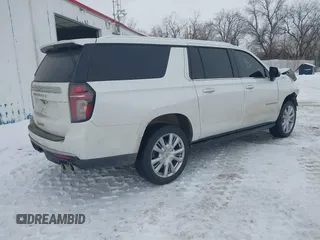 2022 Chevrolet Suburban High Country with VIN 1GNSKGKLXNR151036, listed as a IAAI auction lot 41549439 with 97,613 mi miles and . Bid and sale history available at DreamBid. Image 4.