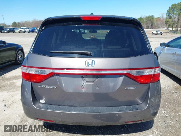 2012 Honda Odyssey Touring with VIN 5FNRL5H91CB057344, listed as a IAAI auction lot 41835272 with 158,854 mi miles. Bid and sale history available at carsss.com. Image 16.