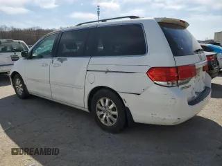 2010 Honda Odyssey EX-L with VIN 5FNRL3H77AB051869, listed as a Copart auction lot 48473815 with 248,511 mi miles and Salvage Title. Bid and sale history available at DreamBid. Image 2.