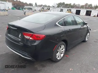 2015 Chrysler 200 Limited with VIN 1C3CCCABXFN709136, listed as a IAAI auction lot 40913236 with 100,774 mi miles and . Bid and sale history available at DreamBid. Image 4.