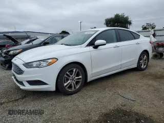 2018 Ford Fusion SE z VIN 3FA6P0H74JR220420, wystawiony jako Copart lot #60254915 z przebiegiem 104 565 mil mil oraz Czysty tytuł • Clean title. Historia ofert i sprzedaży dostępna na DreamBid. Obrazek 1.