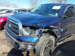 2013 Toyota Tundra 4WD Truck with VIN 5TFUM5F14DX043076, listed as a IAAI auction lot 41633905 with 157,850 mi miles. Bid and sale history available at carsss.com. Image 6.