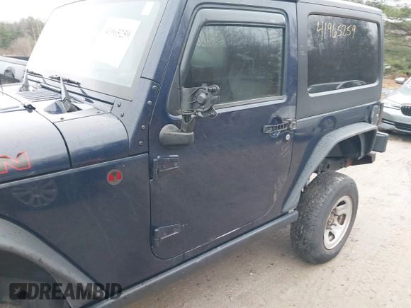 2013 Jeep Wrangler Rubicon 10th Anniversary with VIN 1C4BJWCG7DL544145, listed as a IAAI auction lot 41965259 with 125,900 mi miles and . Bid and sale history available at carsss.com. Image 6.