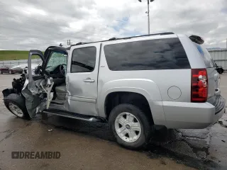 2011 Chevrolet Suburban LT with VIN 1GNSKJE31BR224959, listed as a Copart auction lot 58974345 with Not provided miles and Salvage title. Bid and sale history available at DreamBid. Image 2.