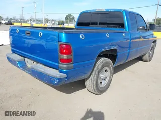 1999 Dodge Ram 1500 with VIN 3B7HC13Z2XG197088, listed as a IAAI auction lot 41686269 with 210,662 mi miles. Bid and sale history available at carsss.com. Image 4.