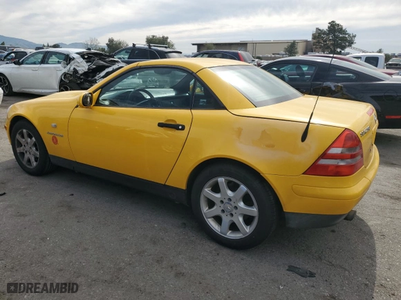 2000 Mercedes-Benz SLK-Class Kompressor with VIN WDBKK47FXYF164836, listed as a Copart auction lot 46904375 with 127,424 mi miles and Salvage Title. Bid and sale history available at carsss.com. Image 2.