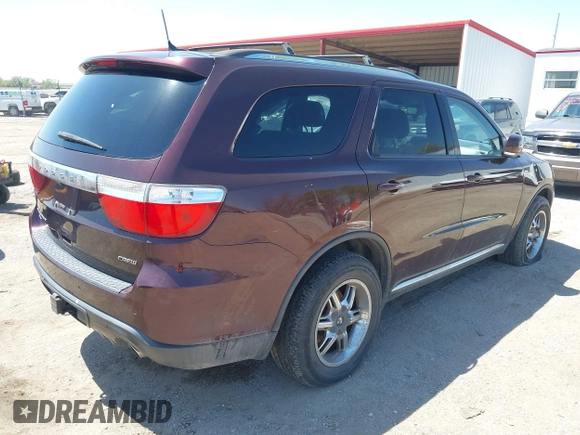 2012 Dodge Durango Crew with VIN 1C4RDJDG0CC337408, listed as a IAAI auction lot 42193647 with 186,352 mi miles and . Bid and sale history available at carsss.com. Image 4.