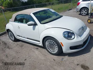 2013 Volkswagen Beetle 2.5L with VIN 3VW5P7AT3DM828370, listed as a IAAI auction lot 41800910 with 62,920 mi miles and . Bid and sale history available at DreamBid. Image 1.