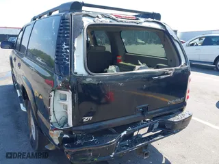 2002 Chevrolet Suburban LT with VIN 3GNFK16Z92G278272, listed as a IAAI auction lot 42073331 with 443,324 mi miles. Bid and sale history available at carsss.com. Image 12.