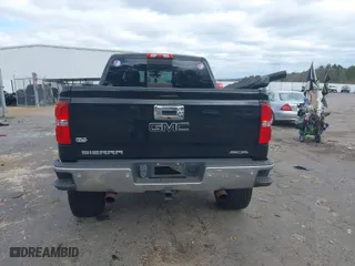 2015 GMC Sierra 1500 SLT with VIN 3GTU2VEJ1FG397717, listed as a IAAI auction lot 41721899 with 121,807 mi miles. Bid and sale history available at carsss.com. Image 17.