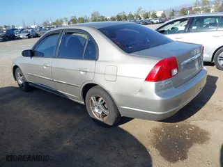 2003 Honda Civic LX with VIN 2HGES16563H521654, listed as a IAAI auction lot 42094679 with 157,031 mi miles. Bid and sale history available at carsss.com. Image 3.