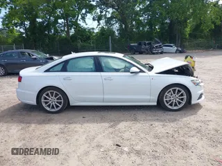 2018 Audi A6 Premium Plus z VIN WAUG3AFC5JN045370, wystawiony jako IAAI lot #42342165 z przebiegiem 107 705 mil mil oraz . Historia ofert i sprzedaży dostępna na DreamBid. Obrazek 14.