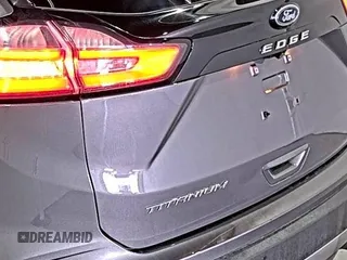 2021 Ford Edge Titanium z VIN 2FMPK3K92MBA53689, wystawiony jako IAAI lot #42501151 z przebiegiem 93 941 mil mil oraz . Historia ofert i sprzedaży dostępna na DreamBid. Obrazek 19.