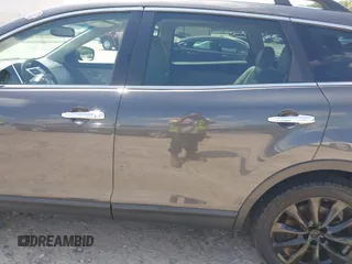 2014 Mazda CX-9 Grand Touring with VIN JM3TB2DA4E0436340, listed as a IAAI auction lot 42442249 with 102,856 mi miles and . Bid and sale history available at DreamBid. Image 6.