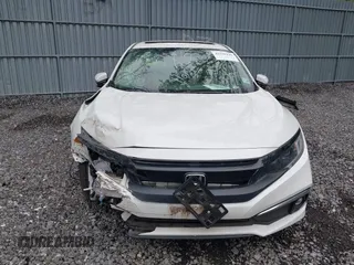 2019 Honda Civic EX z VIN 19XFC1F35KE200536, wystawiony jako IAAI lot #42198146 z przebiegiem 7 231 mil mil oraz . Historia ofert i sprzedaży dostępna na DreamBid. Obrazek 11.