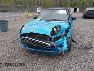 2016 MINI Convertible with VIN WMWWG5C52G3A81084, listed as a IAAI auction lot 41954333 with 78,558 mi miles and . Bid and sale history available at DreamBid. Image 6.