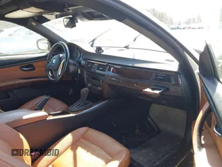 2011 BMW 3 Series 328i with VIN WBAKE3C58BE557891, listed as a IAAI auction lot 41717023 with 99,053 mi miles and . Bid and sale history available at carsss.com. Image 5.