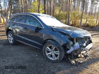2014 Acura RDX Tech Pkg with VIN 5J8TB3H51EL000198, listed as a IAAI auction lot 41240142 with 107,041 mi miles. Bid and sale history available at carsss.com. Image 1.
