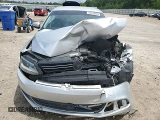 2013 Volkswagen Jetta SE z VIN 3VWDX7AJ6DM452161, wystawiony jako Copart lot #60510695 z przebiegiem Nie podano mil oraz Szkoda całkowita • Salvage title. Historia ofert i sprzedaży dostępna na DreamBid. Obrazek 5.