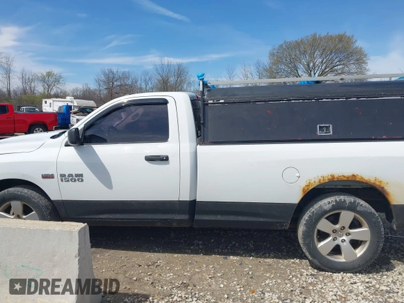 2013 Ram 1500 Tradesman with VIN 3C6JR7DT4DG506575, listed as a IAAI auction lot 42129693 with 176,404 mi miles and . Bid and sale history available at DreamBid. Image 14.