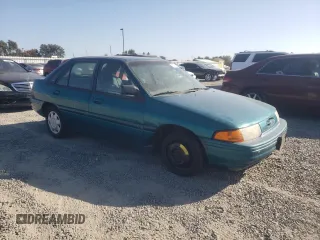 1995 Ford Escort z VIN 1FASP14J9SW304866, wystawiony jako Copart lot #73006174 z przebiegiem 126 068 mil mil oraz Szkoda całkowita • Salvage title. Historia ofert i sprzedaży dostępna na DreamBid. Obrazek 4.
