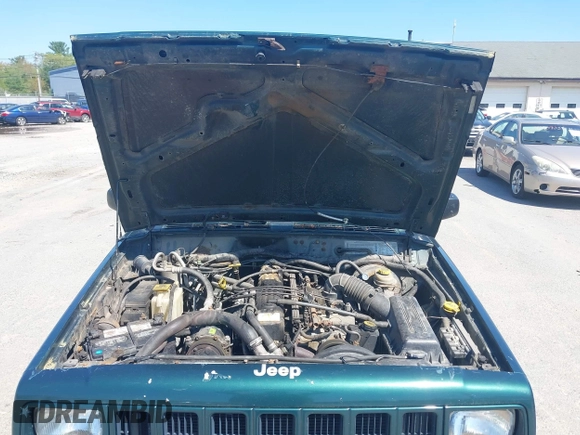 2000 Jeep Cherokee z VIN 1J4FF48S2YL253251, wystawiony jako IAAI lot #42243268 z przebiegiem 154 136 mil mil oraz . Historia ofert i sprzedaży dostępna na DreamBid. Obrazek 10.