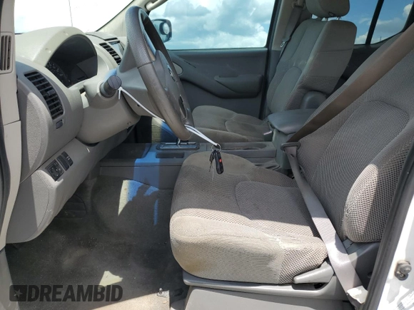 2005 Nissan Frontier LE with VIN 1N6AD07U65C417532, listed as a Copart auction lot 61588315 with 197,514 mi miles and Salvage title. Bid and sale history available at DreamBid. Image 7.