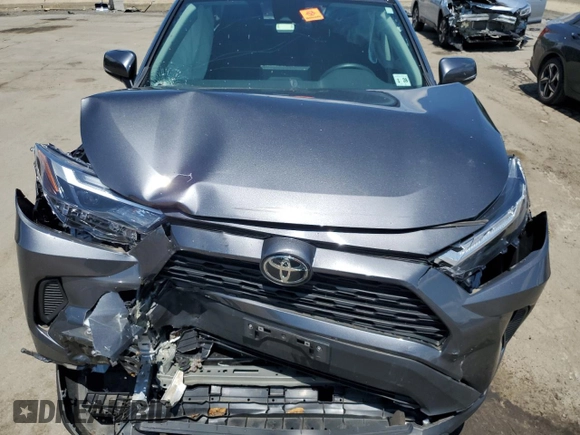 2023 Toyota RAV4 XLE with VIN 2T3P1RFV0PC331350, listed as a Copart auction lot 61234355 with 27,962 mi miles and Salvage title. Bid and sale history available at DreamBid. Image 12.