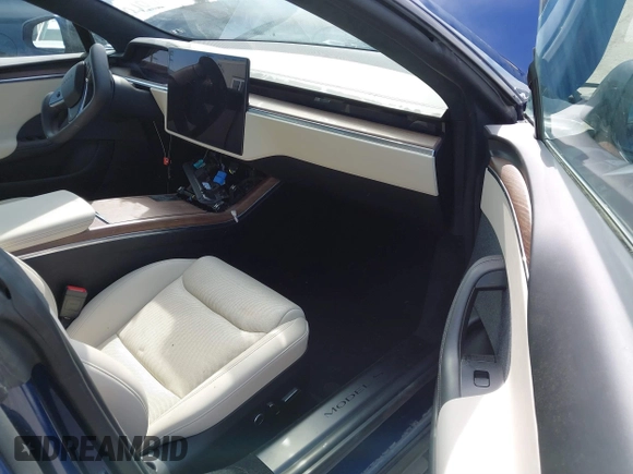 2021 Tesla Model S Long Range with VIN 5YJSA1E51MF442874, listed as a IAAI auction lot 39406495 with 36,127 mi miles and . Bid and sale history available at DreamBid. Image 5.
