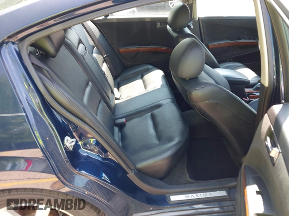 2004 Nissan Maxima SE with VIN 1N4BA41E04C903587, listed as a IAAI auction lot 42433154 with 213,535 mi miles and . Bid and sale history available at DreamBid. Image 8.