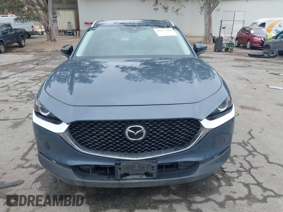 2022 Mazda CX-30 S Carbon Edition with VIN 3MVDMBCL0NM456154, listed as a IAAI auction lot 42153202 with 40,372 mi miles and . Bid and sale history available at DreamBid. Image 12.