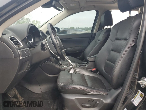 2016 Mazda CX-5 Grand Touring z VIN JM3KE2DY5G0676290, wystawiony jako Copart lot #54155325 z przebiegiem 124 743 mil mil oraz Szkoda całkowita • Salvage title. Historia ofert i sprzedaży dostępna na DreamBid. Obrazek 7.