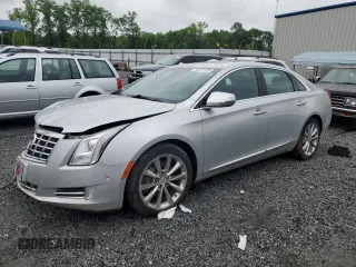 2014 Cadillac XTS Luxury with VIN 2G61M5S30E9187222, listed as a Copart auction lot 54511125 with 0 mi miles and Salvage Title. Bid and sale history available at carsss.com. Image 1.