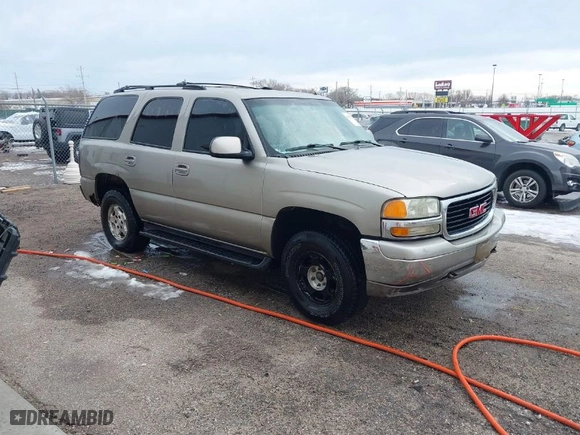 2002 GMC Yukon SLT with VIN 1GKEK13Z92R253868, listed as a IAAI auction lot 41335170 with 243720 miles. Bid and sale history available at carsss.com. Image 1.