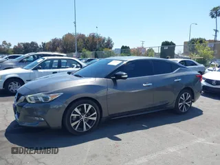 2018 Nissan Maxima Platinum z VIN 1N4AA6AP1JC388815, wystawiony jako IAAI lot #42098902 z przebiegiem 80 677 mil mil oraz . Historia ofert i sprzedaży dostępna na DreamBid. Obrazek 14.