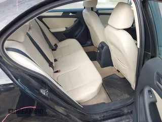 2012 Volkswagen Jetta Sedan SE w/Convenience with VIN 3VWDX7AJ5CM398348, listed as a IAAI auction lot 41708085 with 147,477 mi miles. Bid and sale history available at carsss.com. Image 8.