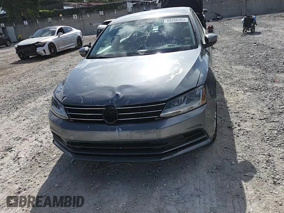 2017 Volkswagen Jetta S with VIN 3VW2B7AJ9HM344306, listed as a Copart auction lot 60256965 with 23,055 mi miles and Salvage title. Bid and sale history available at DreamBid. Image 13.