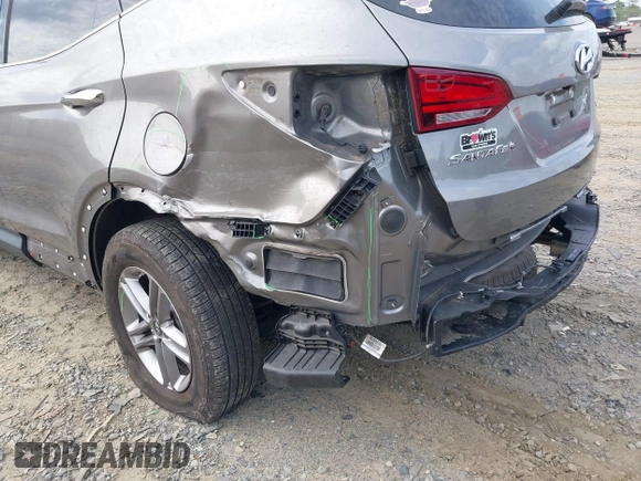 2018 Hyundai Santa Fe 2.4L z VIN 5NMZUDLB4JH073857, wystawiony jako IAAI lot #42200208 z przebiegiem 127 038 mil mil oraz . Historia ofert i sprzedaży dostępna na DreamBid. Obrazek 6.