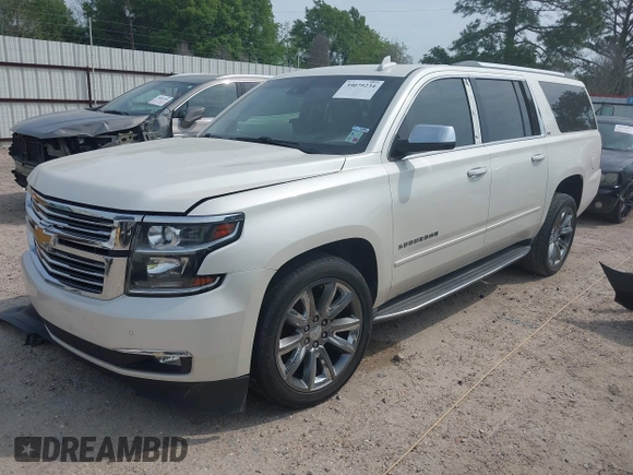 2015 Chevrolet Suburban LTZ with VIN 1GNSCKKC5FR740352, listed as a IAAI auction lot 39075234 with 112,945 mi miles and . Bid and sale history available at DreamBid. Image 2.