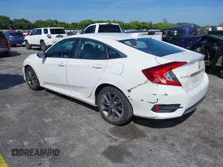 2021 Honda Civic Sedan EX with VIN 2HGFC1F37MH700657, listed as a IAAI auction lot 41633417 with 87,379 mi miles. Bid and sale history available at carsss.com. Image 3.