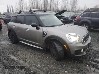 2017 MINI Countryman Cooper S with VIN WMZYT5C33H3D80073, listed as a Copart auction lot 87429094 with 83,566 mi miles and Salvage title. Bid and sale history available at DreamBid. Image 4.