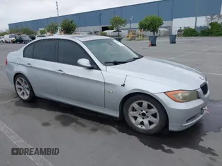 2007 BMW 3 Series 328i with VIN WBAVC53597FZ70807, listed as a IAAI auction lot 42078844 with 187,958 mi miles and . Bid and sale history available at carsss.com. Image 1.