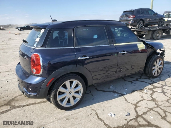 2014 MINI Cooper Countryman S with VIN WMWZC3C5XEWP25131, listed as a Copart auction lot 42112515 with 90,513 mi miles and Salvage Title. Bid and sale history available at carsss.com. Image 3.