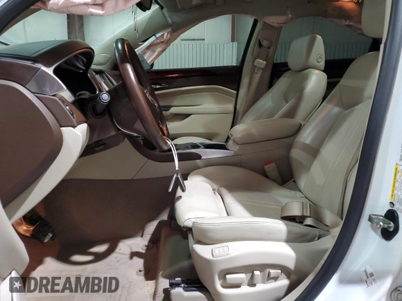 2016 Cadillac SRX Performance Collection with VIN 3GYFNCE36GS525836, listed as a Copart auction lot 84502634 with 94,639 mi miles and Salvage title. Bid and sale history available at DreamBid. Image 7.
