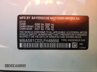2020 BMW 3 Series 330i with VIN WBA5R1C02LFH48666, listed as a Copart auction lot 67959402 with 57,074 mi miles. Bid and sale history available at carsss.com. Image 13.