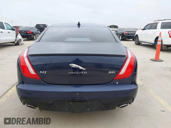 2018 Jaguar XJ R-Sport with VIN SAJWA1C74J8W14026, listed as a IAAI auction lot 42032719 with 95,263 mi miles and . Bid and sale history available at DreamBid. Image 16.